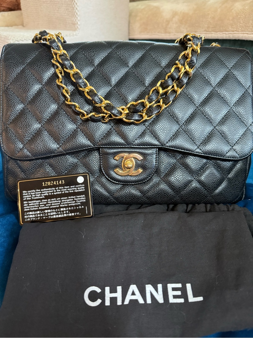 CHANEL series 12 black caviar single flap jumbo
